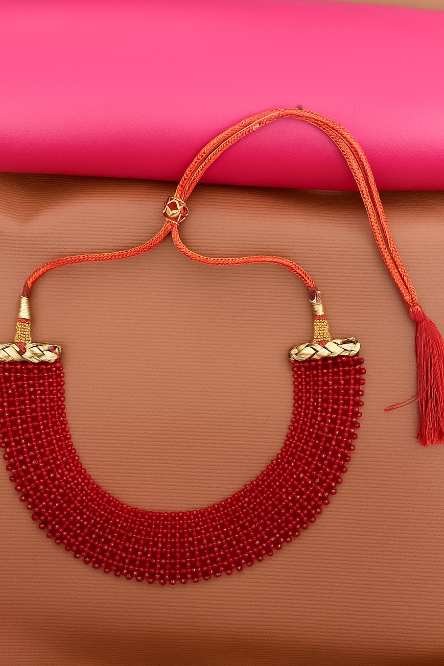 Elegant Red Beaded Necklace with Gold Accents and Tassel Closure