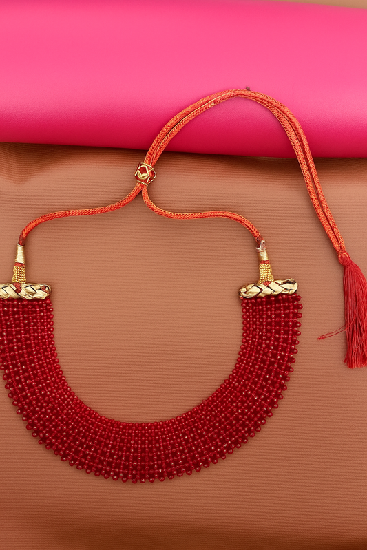Elegant Red Beaded Necklace with Gold Accents and Tassel Closure